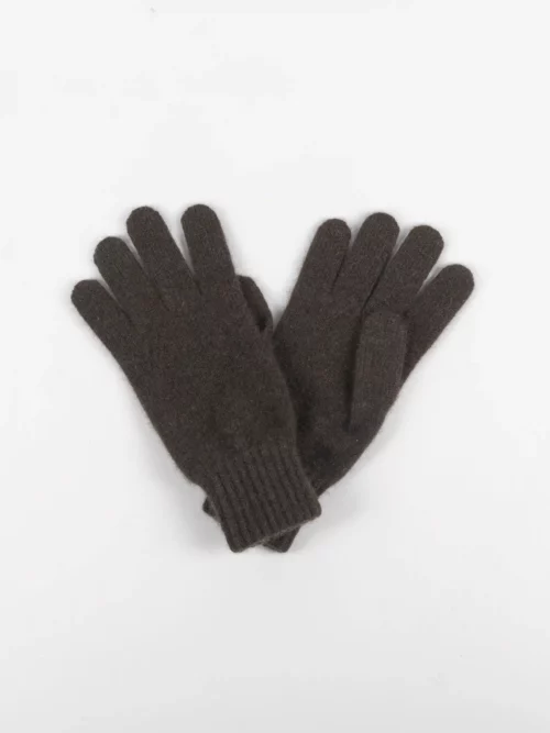Paire de gants en laine de yack marron foncé posés sur une surface blanche.