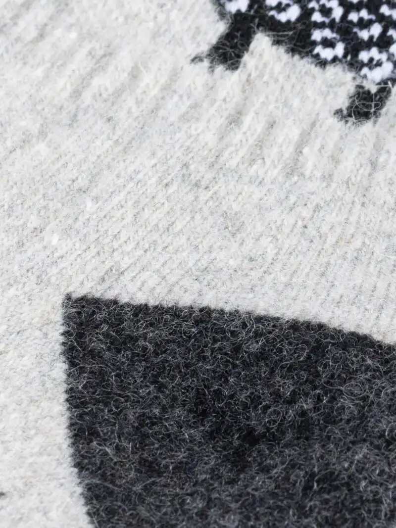 texture de chausettes gris en laine de mongolie.